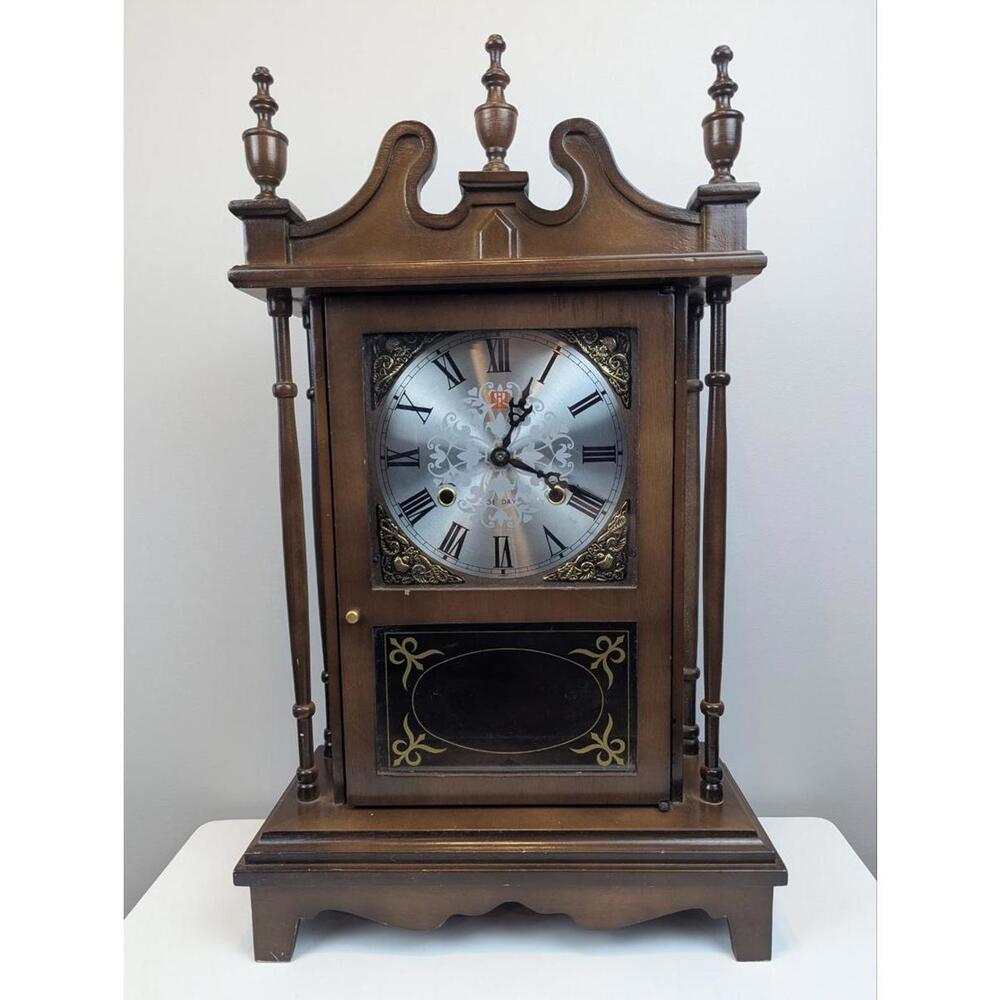Julian International KJ805 31-Day Key Wind Wall Clock with Ornate Design 25x15